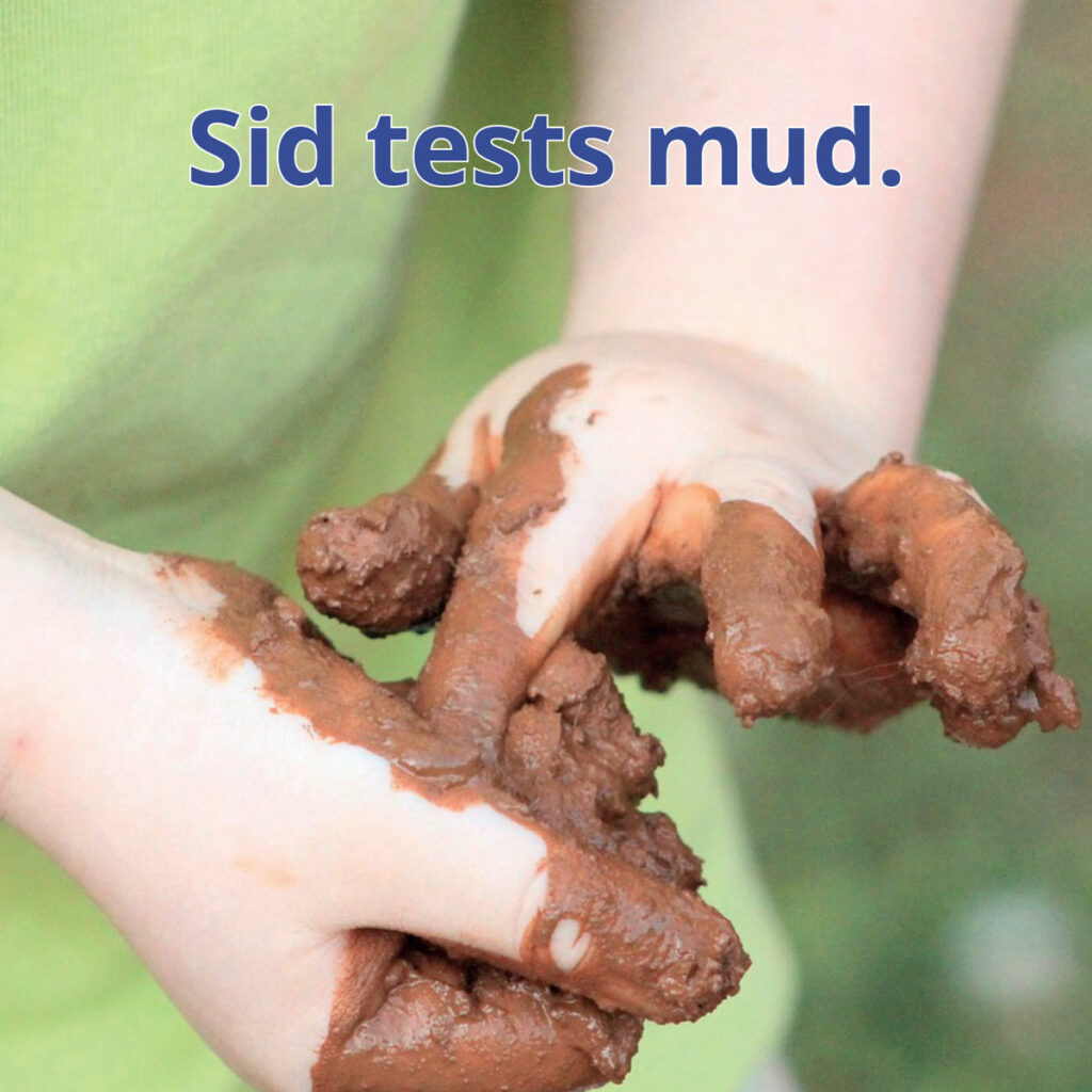 Mud reader image of child's hands covered in mud